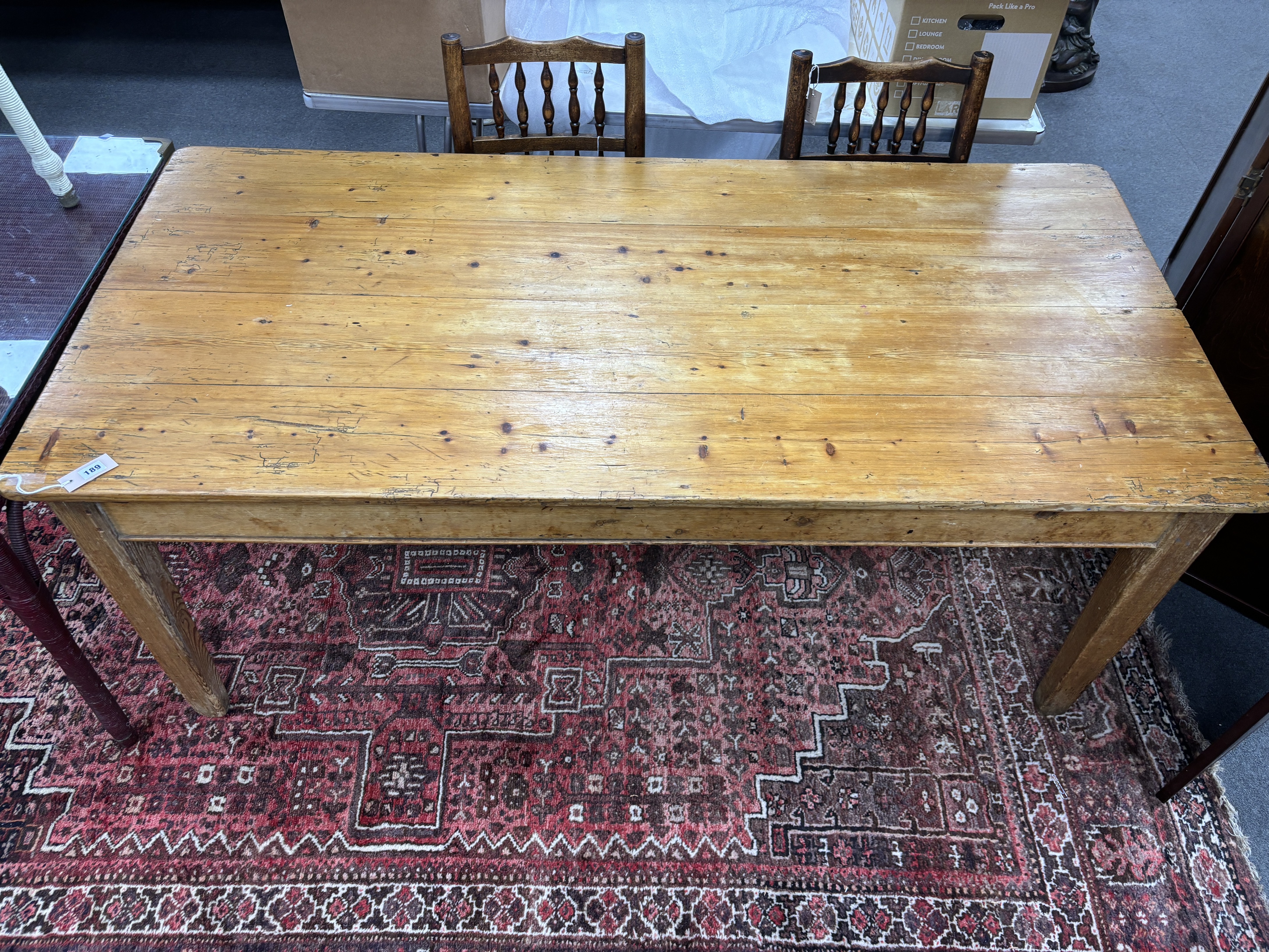 A 19th century rectangular pine kitchen table, width 182cm, depth 88cm, height 71cm. Condition - fair